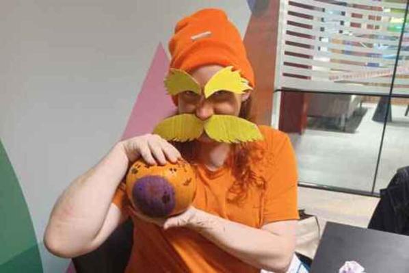 Member of Scream queens soc with pumpkin