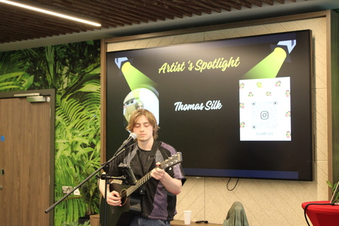 Singer performing at QUB Psychology social event