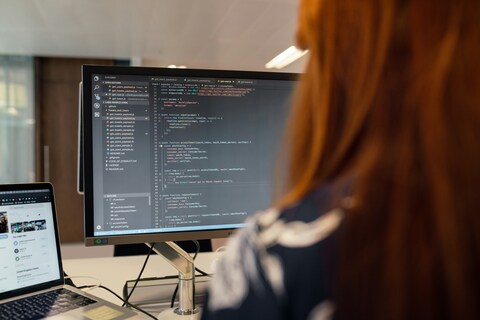 Software engineer working at desktop