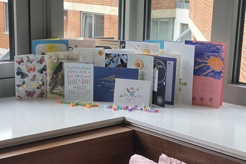 Group of cards on a window sill