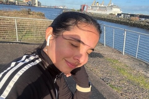 Student jogging in Titanic Quarter