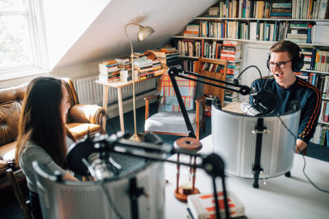 Two students recording a podcast