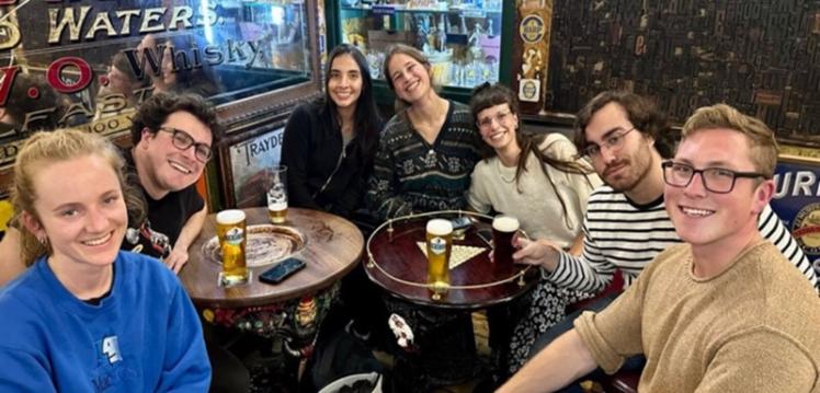 Students sitting together in duke of york bar