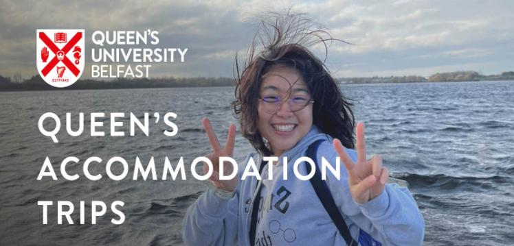 Student posing in front of lake