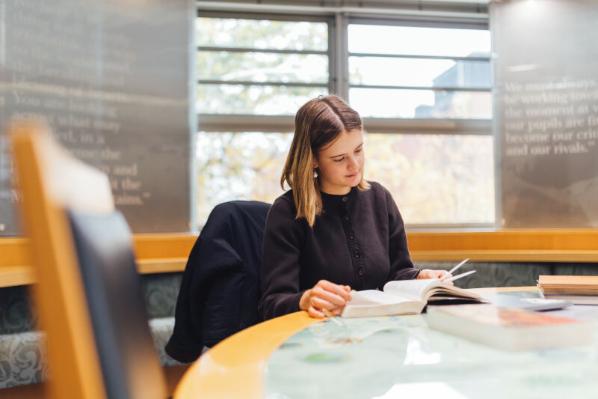 Student Tessa studies in CS Lewis reading room