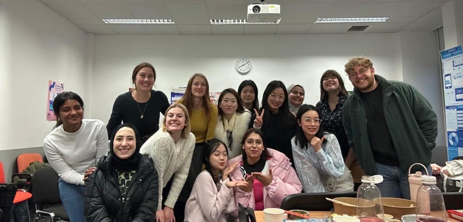 Student Thu with classmates in study room