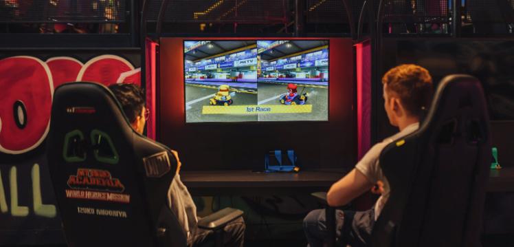 Two students gaming in Reboot Cafe