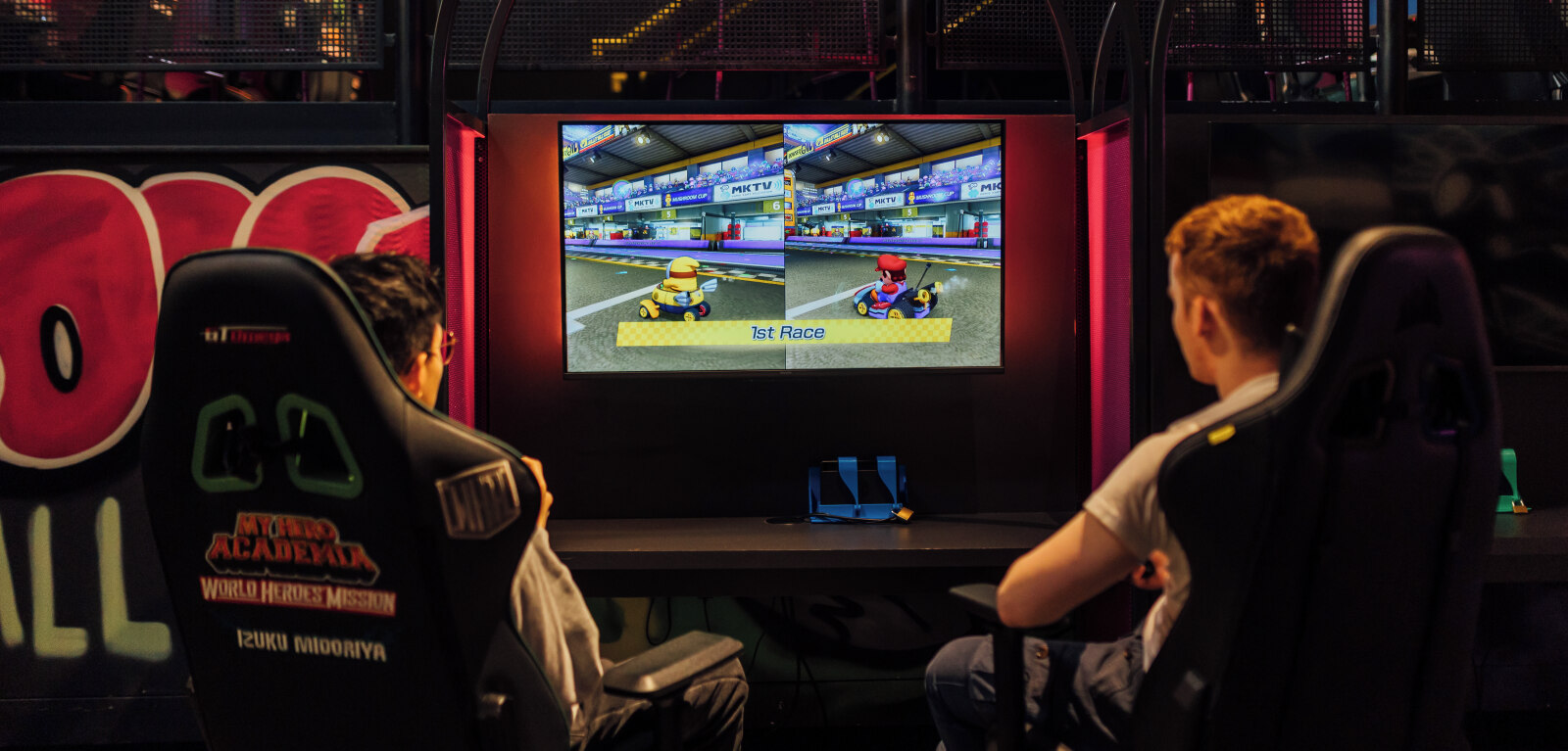 Two students gaming in Reboot Cafe