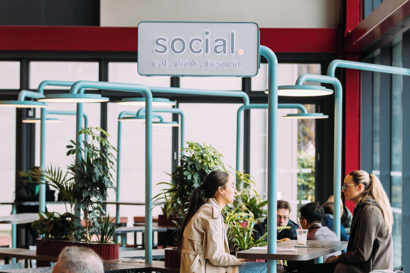 Students sit in Social Cafe in One Elmwood