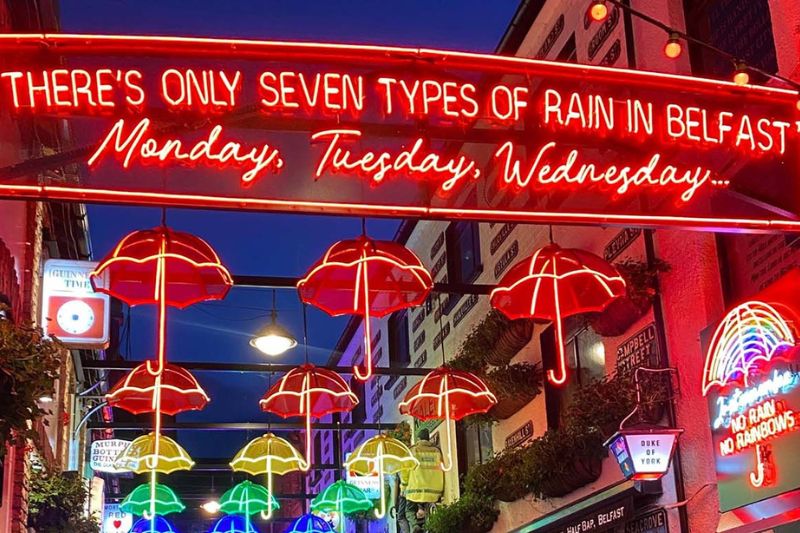 Commercial court umbrellas at night