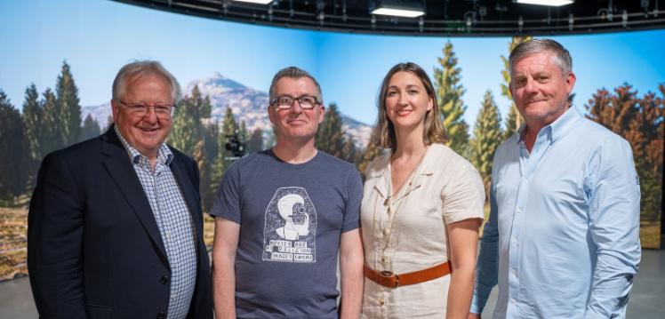 Small group of people in the MediaLab at Queen's