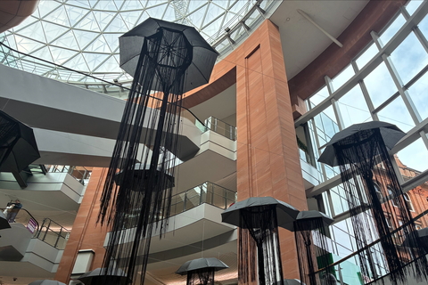 Black umbrella display inside Victoria Square