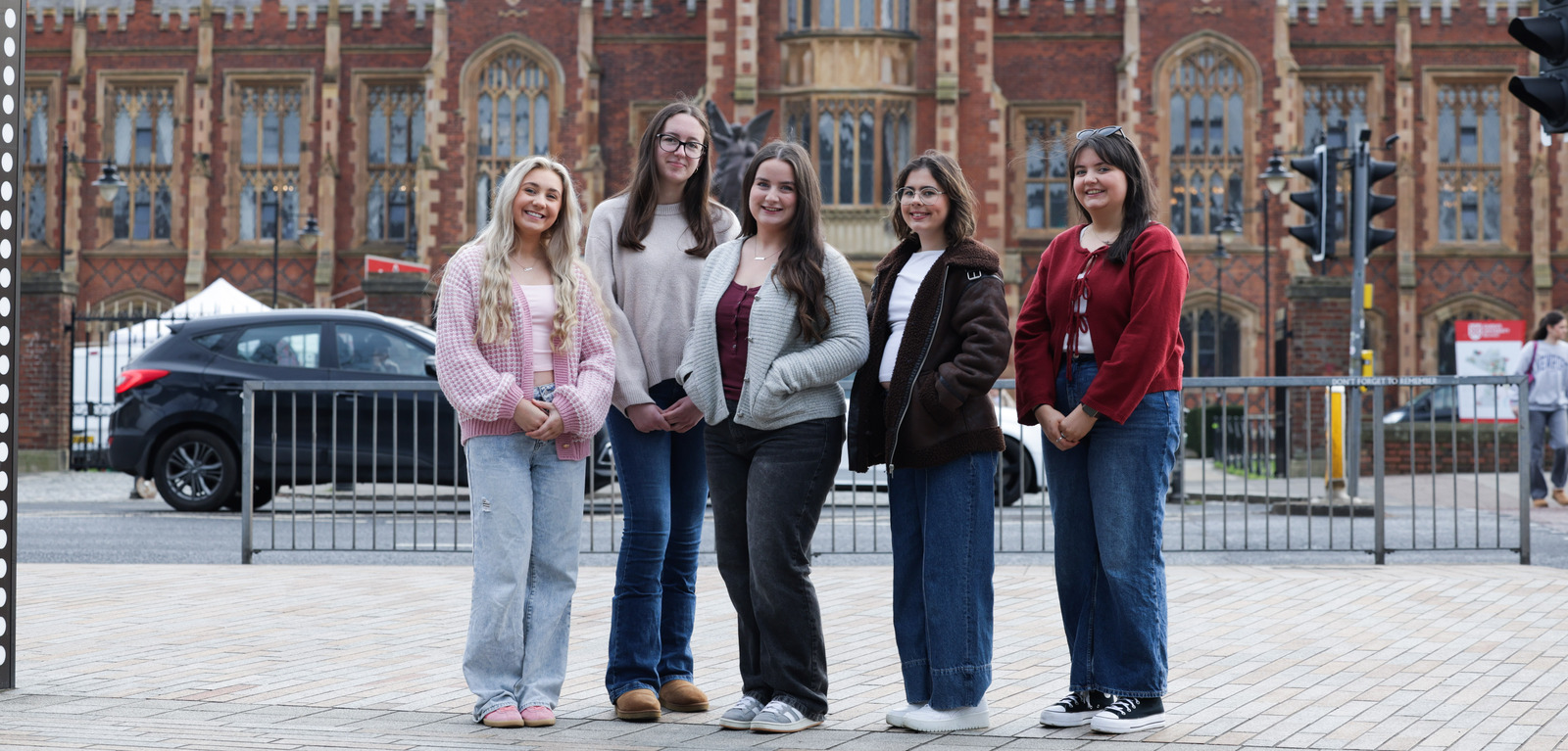 Members of WTG society outside Queen's