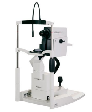 An advanced imaging optometry camera sitting patient side facing against a white background.