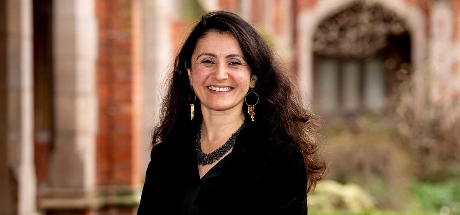 smiling woman with brown hair