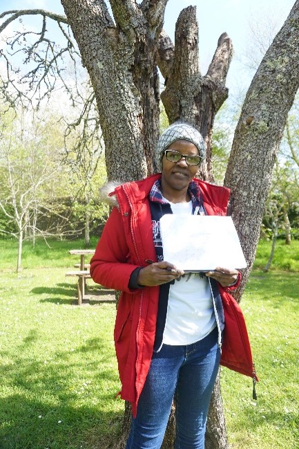 Person holding up paper