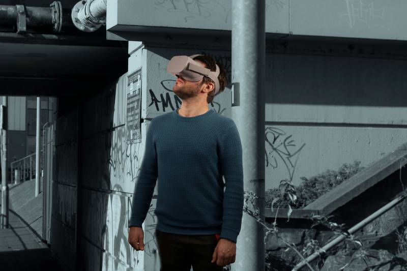 Man standing wearing VR technology
