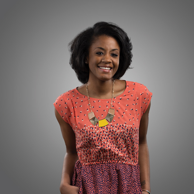 Informal studio photograph of a smiling international female student