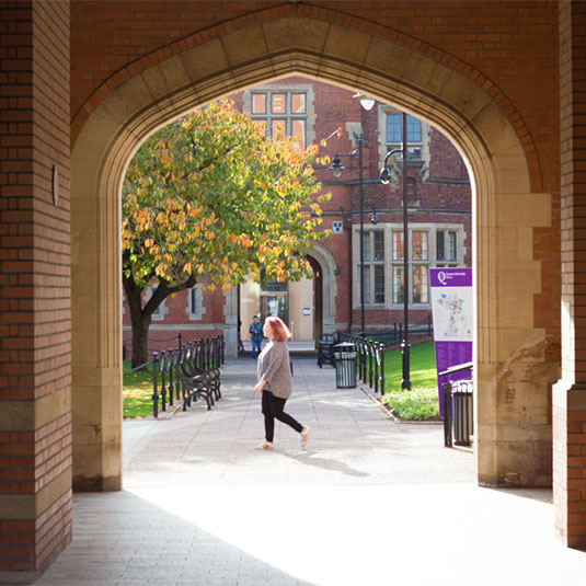 student through archway