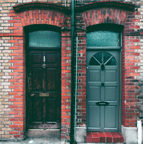 Two old doors, one slightly newer than the other one