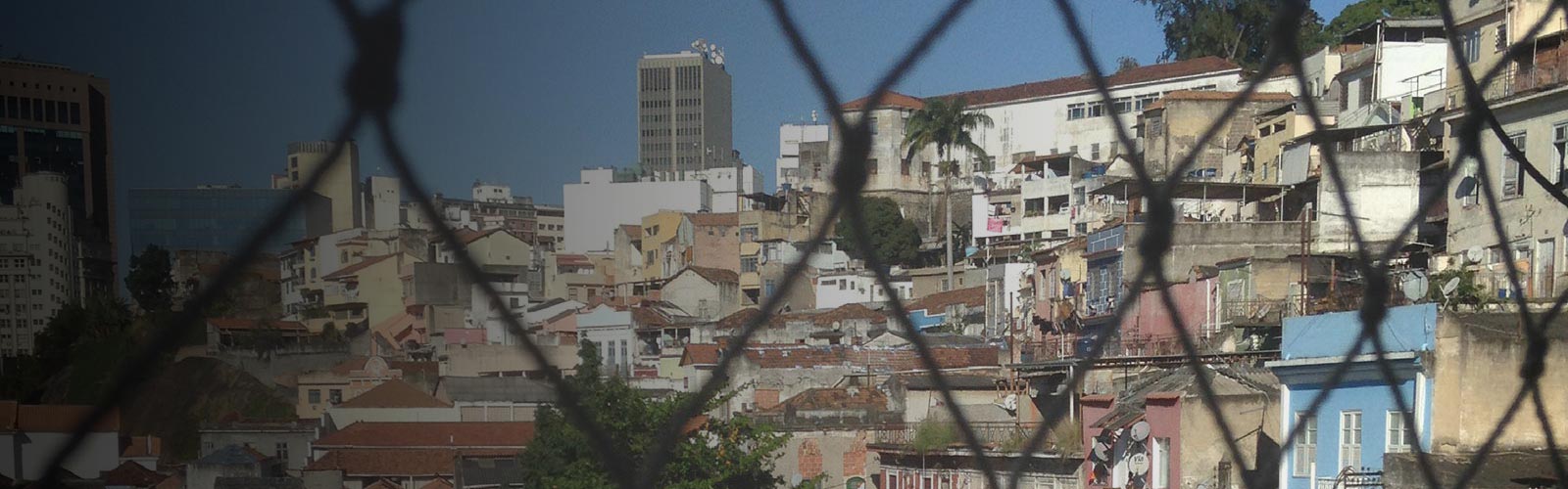 Rio De Janeiro on warm summers day from behind wired railings