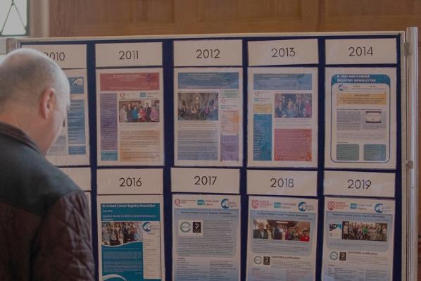 A person viewing newsletters