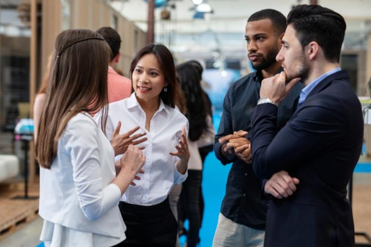 A group of business professionals talking