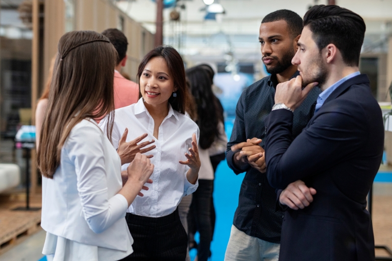 A group of business professionals talking