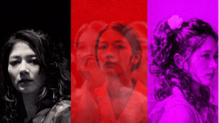 Two people looking ahead one person looking to the side