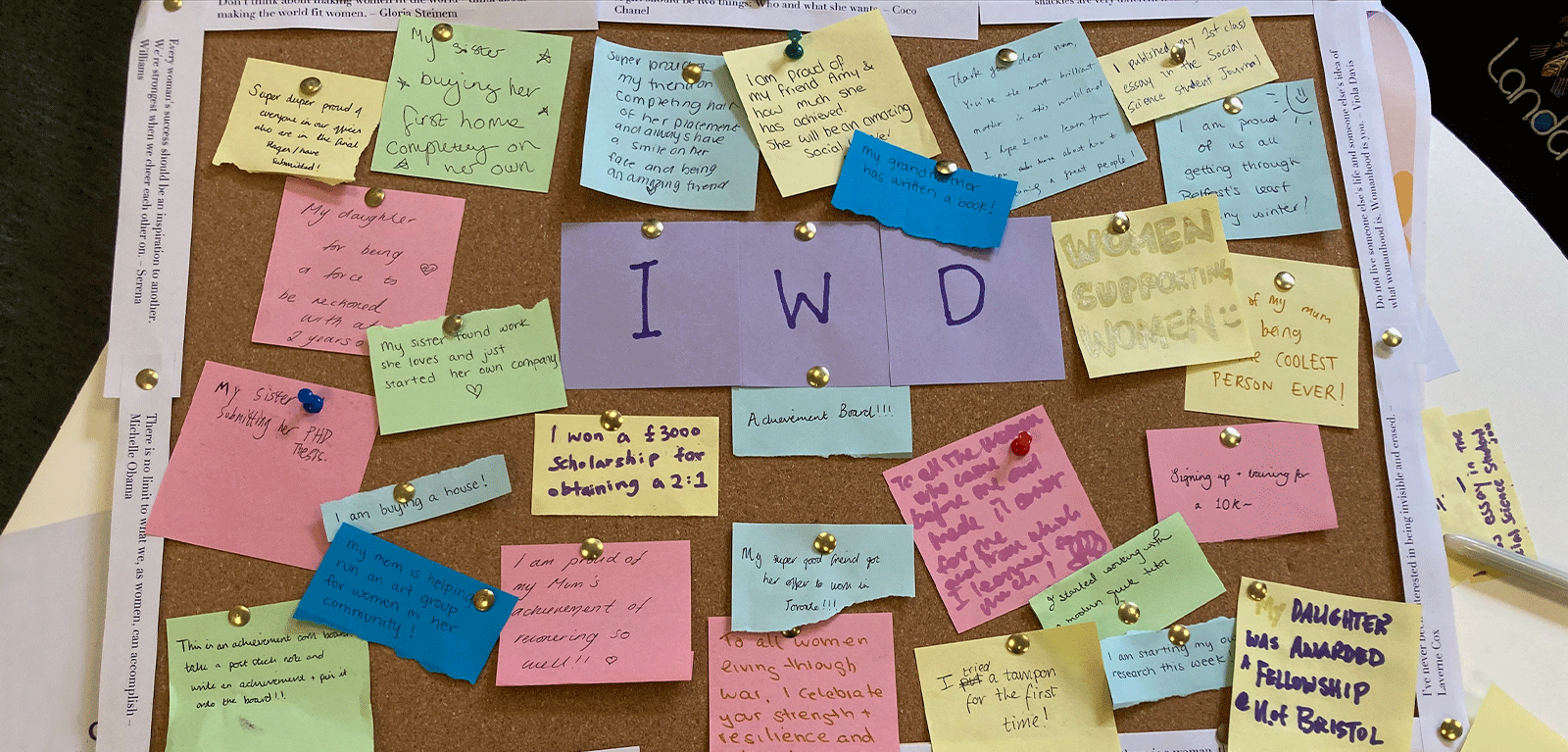 A cork board displaying achievements written by attendees of the International Women's Day Celebration Event at SSESW