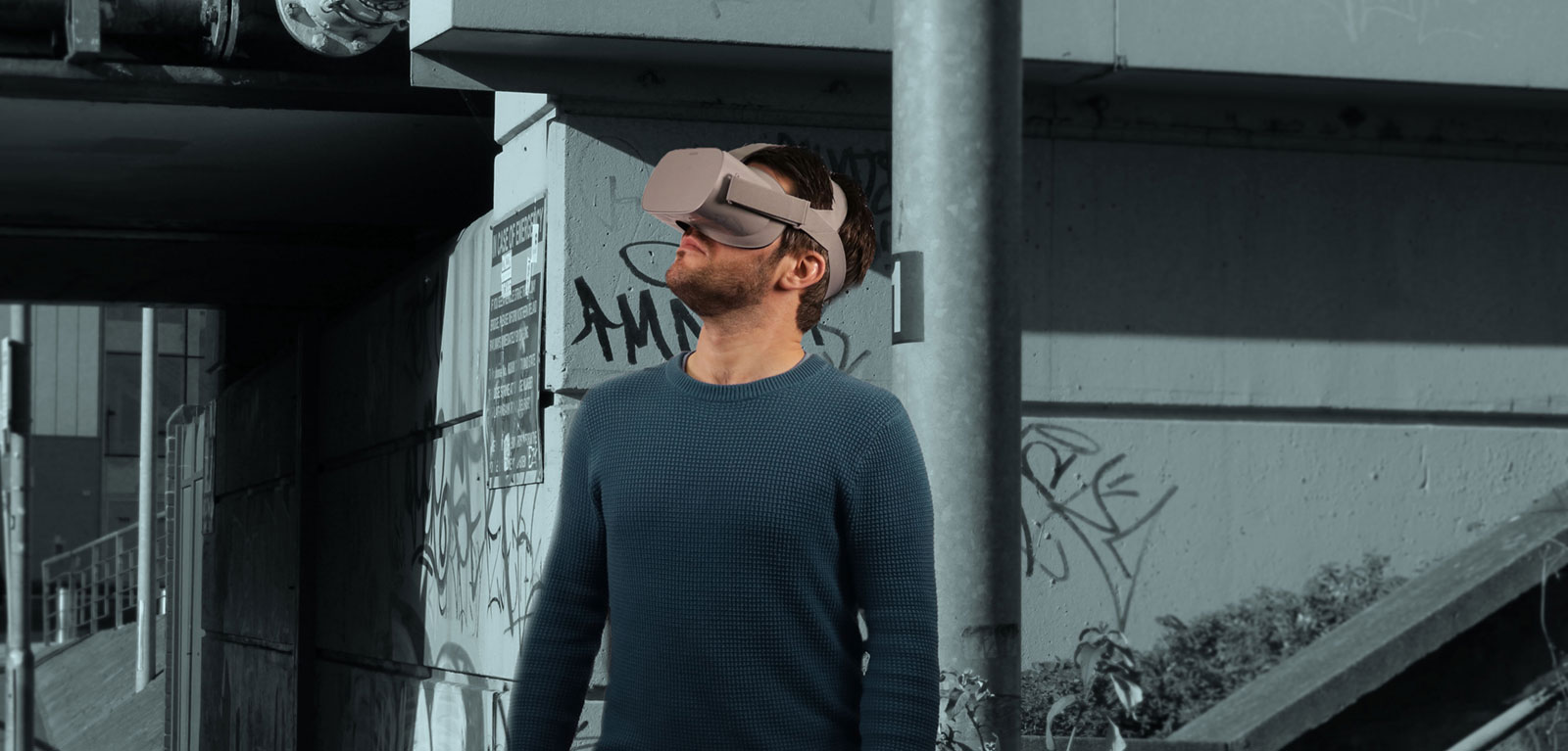 Photo: man wearing a VR headset