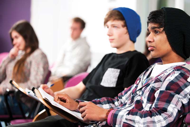PHOTO: teen boys in class