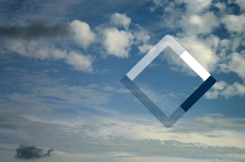 Abstract illustration of blue sky with white clouds and 3d diamond shape in foreground.