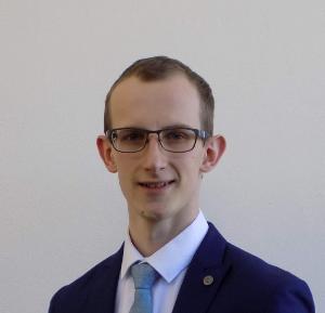 PhD student profile photo, a male student head shot