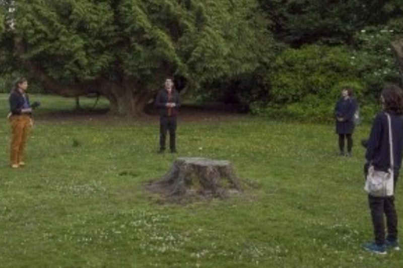 Choir singing in a park