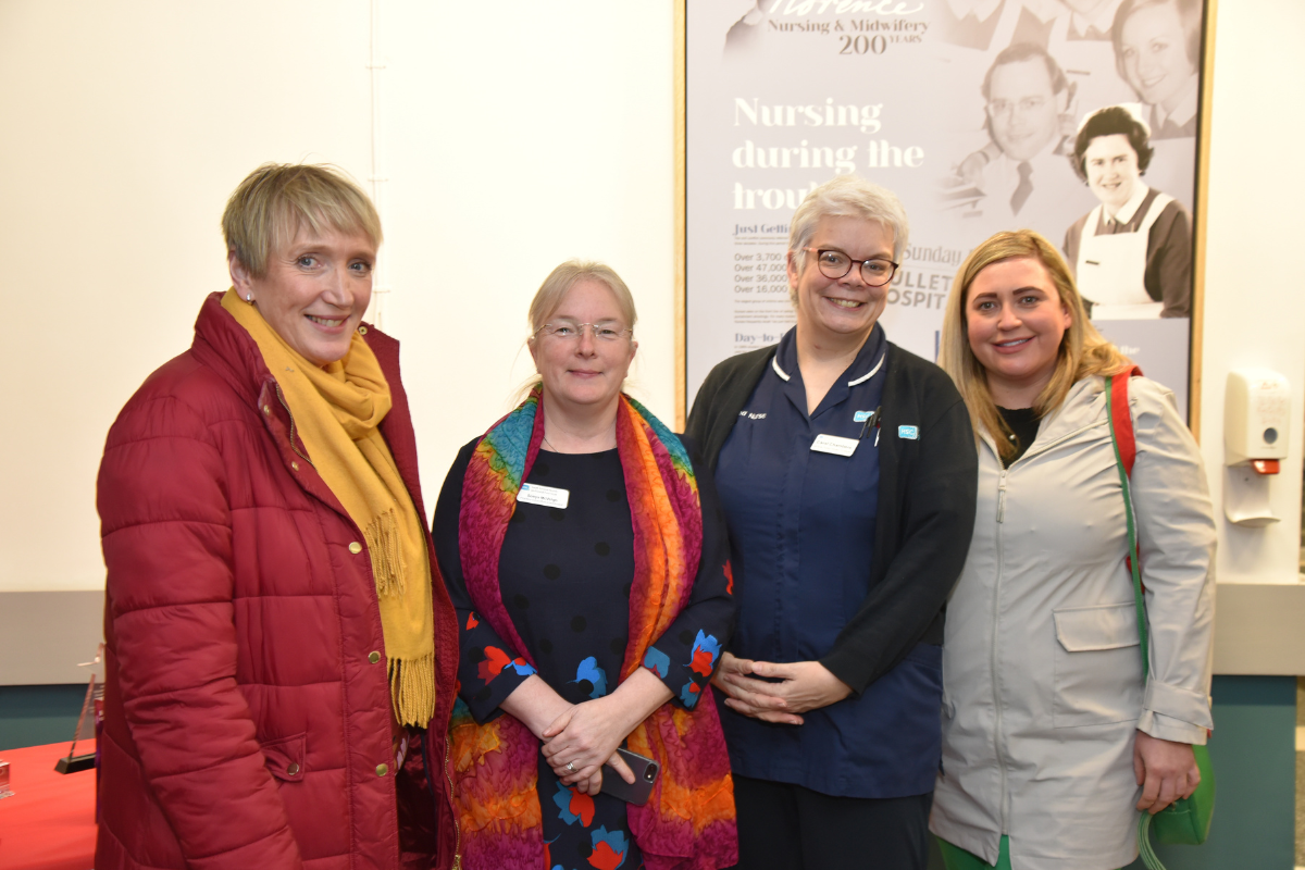 Florence Nightingale Exhibition four attendees smiling to camera