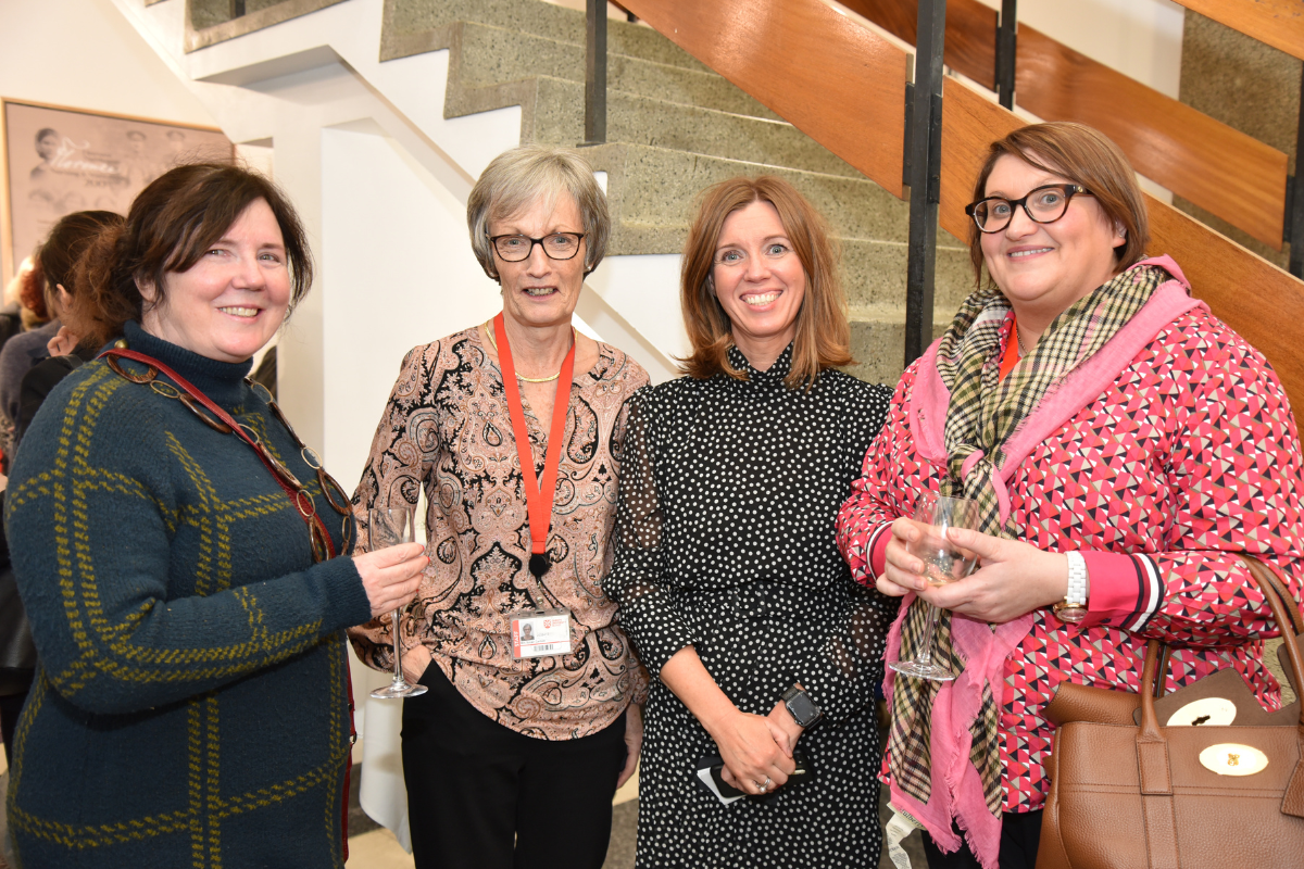 Four members of staff attending the Florence Nightingale Exhibition