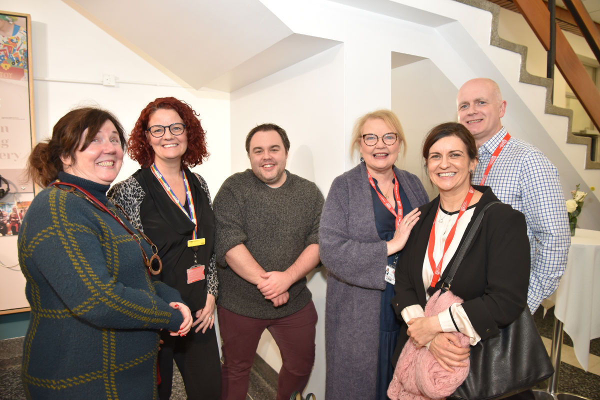 Six members of staff smiling to camera at the Florence Nightingale Exhibition