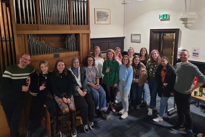 Students and lecturers gathered together in the McMordie Hall