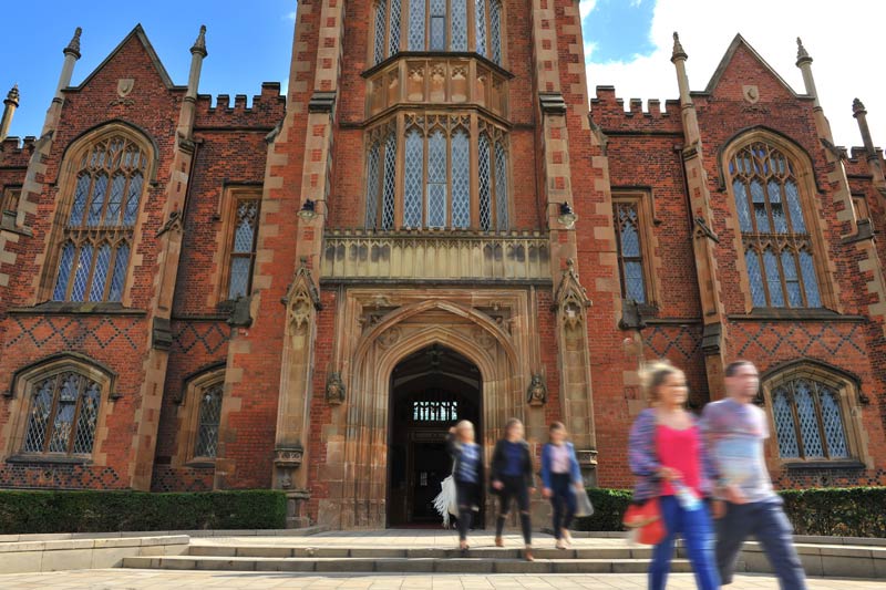 Close up of main entrance to Lanyon building with students coming out