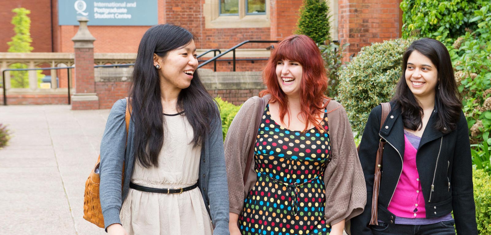 Students walking past South Arch