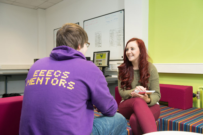 School Peer Mentor chatting informally to a student