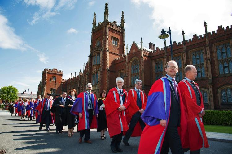 Photo of staff in PhD gowns