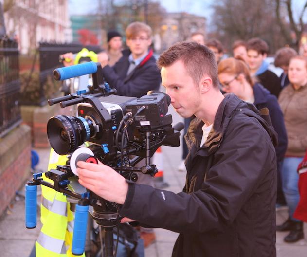 Student using film camera