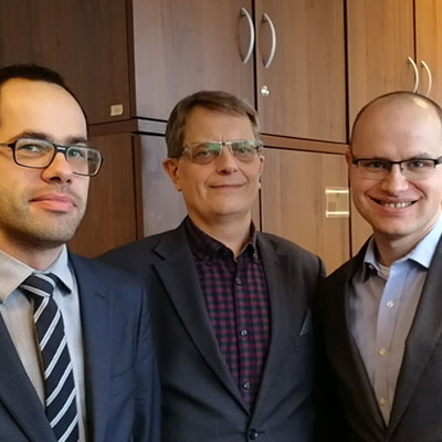 Judge Andrzej Turliński, the Judge President of Polish Competition Court with Dr Marek Martyniszyn and Dr hab. Maciej Bernatt during a research interview in December 2017