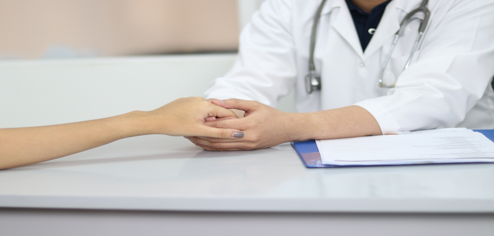 Nurse comforting caregivers