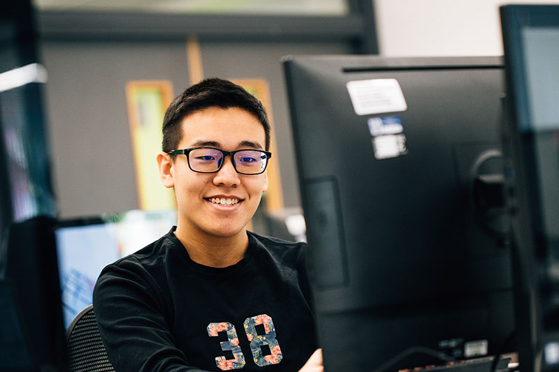 A Student using one of the many computers in the Computer Science Building