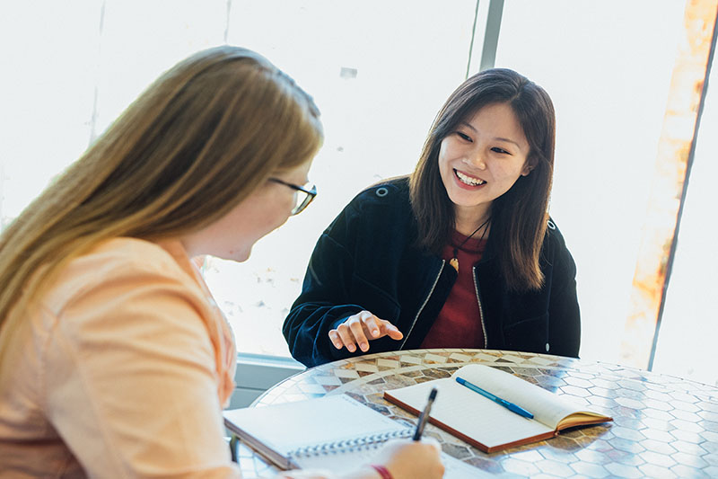 A student assisting another student