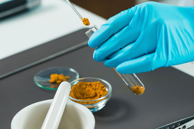 Samples being placed in a test tube