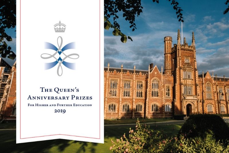 Queen's anniversary prize logo over the op of the Lanyon building